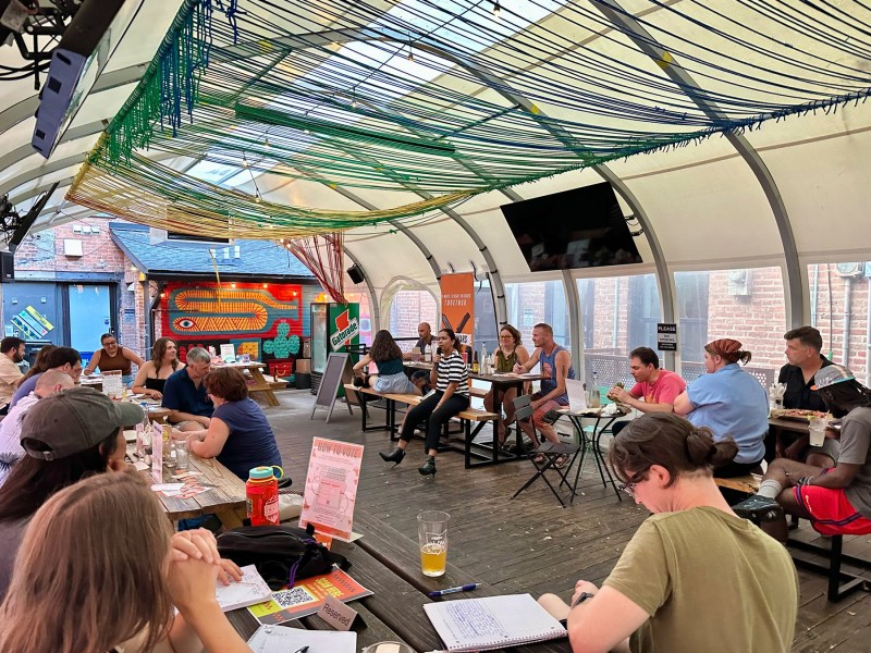A view of people participating in Story Wars at Jukebox