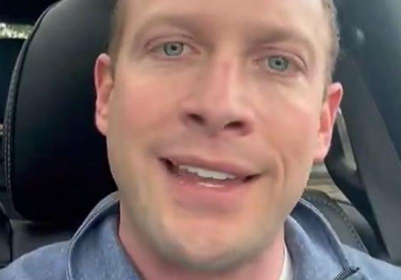 A selfie of a man in a car.