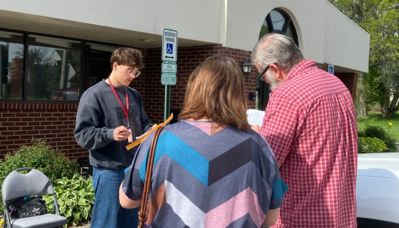 Voters outside a polling place.